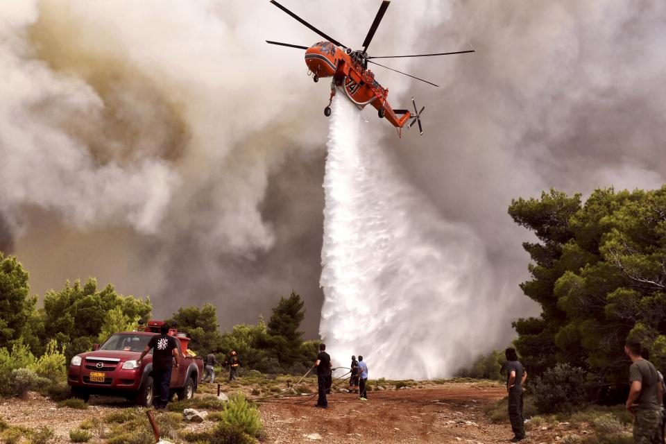 GREECE-FIRE Grecia en duelo por virulentos incendios; más de 70 muertos